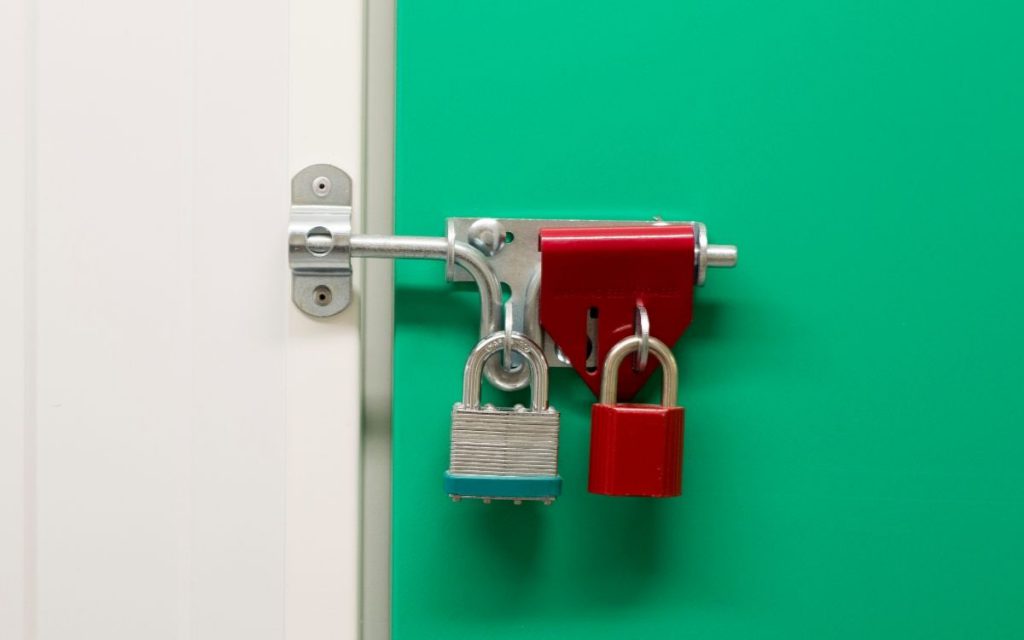 storage unit door with red lock overlock