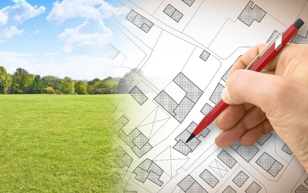 architectural plan overlaid on an image of a grassy field